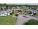 Picturesque aerial view of the townhome complex, surrounded by lush greenery and serene water features at 105 Wood Duck Cir # D, Daytona Beach, FL 32119