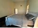 Spacious bedroom with high ceilings and natural light coming from large windows at 105 Wood Duck Cir # D, Daytona Beach, FL 32119
