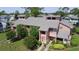 Charming two-story townhouse featuring a gray roof, well-kept landscaping, and a welcoming entrance at 105 Wood Duck Cir # D, Daytona Beach, FL 32119
