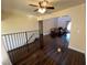 Open floor plan showcasing hardwood floors and view of the living room at 105 Wood Duck Cir # D, Daytona Beach, FL 32119