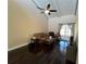 Cozy living room featuring hardwood floors, comfortable seating, and plenty of natural light at 105 Wood Duck Cir # D, Daytona Beach, FL 32119