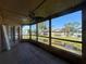 Relaxing screened patio boasting serene views of the pond and landscaping at 105 Wood Duck Cir # D, Daytona Beach, FL 32119