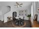 Bright dining area featuring modern decor, stylish furniture, and a decorative bar area at 11812 Metaphor Aly, Orlando, FL 32832
