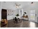 Bright dining area featuring modern decor, stylish furniture, and plenty of natural light at 11812 Metaphor Aly, Orlando, FL 32832