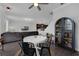 Open-concept living and dining area, ideal for entertaining, adjacent to the kitchen at 11812 Metaphor Aly, Orlando, FL 32832
