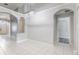 Open-concept dining area with tile flooring and access to other rooms at 1199 Stoneham Dr, Groveland, FL 34736