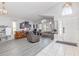 Bright foyer with tile flooring, arched window, and an open living area at 1199 Stoneham Dr, Groveland, FL 34736