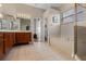 Bathroom featuring a soaking tub and vanity at 12207 Shadowbrook Ln, Orlando, FL 32828
