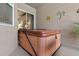 Relaxing hot tub on the back patio, ideal for unwinding and enjoying the outdoors at 12207 Shadowbrook Ln, Orlando, FL 32828