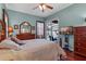 Light-filled main bedroom with backyard pool view at 12207 Shadowbrook Ln, Orlando, FL 32828
