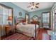 Relaxing main bedroom suite with natural light and beautiful wood accents at 12207 Shadowbrook Ln, Orlando, FL 32828