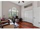Spacious home office with hardwood floors, closet, desk and lots of natural light at 12207 Shadowbrook Ln, Orlando, FL 32828