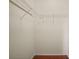 A walk-in closet with a metal wire shelving unit at 1300 Eastern Pecan Pl # 104, Winter Garden, FL 34787