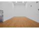 On-site racquetball court with hardwood floor and white walls at 1300 Eastern Pecan Pl # 104, Winter Garden, FL 34787
