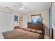 Spacious bedroom with a ceiling fan and a large dresser with television at 1354 Dutch Elm Dr, Altamonte Springs, FL 32714