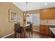 Cozy dining area with wood table and chairs, natural light, and attractive decor at 1354 Dutch Elm Dr, Altamonte Springs, FL 32714