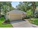 Attractive one-story home with a two-car garage, manicured lawn, and inviting curb appeal at 1354 Dutch Elm Dr, Altamonte Springs, FL 32714
