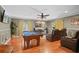 Entertainment room featuring a pool table, television, and comfortable seating ideal for relaxation and enjoyment at 1354 Dutch Elm Dr, Altamonte Springs, FL 32714