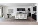 Stylish kitchen with granite countertops, stainless steel appliances, and a breakfast bar area at 1397 Dalkeith Cv, Sanford, FL 32771
