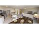 Spacious open floor plan with kitchen island, dining table and cozy living area at 1397 Dalkeith Cv, Sanford, FL 32771