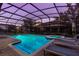 Private backyard with pool, spa, and a screened-in enclosure for year-round enjoyment at 1421 Wexford Way, Davenport, FL 33896