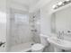 Bathroom featuring walk-in shower and modern fixtures with an ample vanity and lighting at 147 Country Club Dr, Sanford, FL 32771