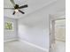 Bedroom featuring neutral paint and easy access to ensuite bathroom at 147 Country Club Dr, Sanford, FL 32771