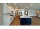 Spacious kitchen with modern cabinetry, countertops, and a large center island at 15569 Orchid Rose Ct, Winter Garden, FL 34787