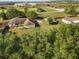 Home and detached garage on a large lot at 16017 Johns Lake Rd, Clermont, FL 34711