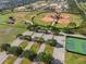 Community baseball and tennis courts offer recreation at 16017 Johns Lake Rd, Clermont, FL 34711