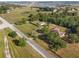 Sprawling property featuring a home with a detached garage at 16017 Johns Lake Rd, Clermont, FL 34711