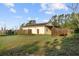 Fenced backyard view with ample space and grassy lawn at 16017 Johns Lake Rd, Clermont, FL 34711