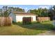 Large, grassy backyard featuring a private, fenced yard at 16017 Johns Lake Rd, Clermont, FL 34711