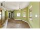 Bright breakfast nook with tile floors, large windows, and lots of natural light at 16017 Johns Lake Rd, Clermont, FL 34711