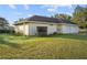 Spacious two-car garage and exterior detail at 16017 Johns Lake Rd, Clermont, FL 34711