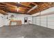 Spacious garage with workbench, perfect for projects and storage at 16017 Johns Lake Rd, Clermont, FL 34711