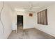 Bright empty room with fresh white paint and a ceiling fan at 16017 Johns Lake Rd, Clermont, FL 34711