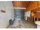 Empty storage with an industrial roll up door at 16017 Johns Lake Rd, Clermont, FL 34711