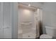 Clean bathroom featuring a shower-tub combination with white tile and modern fixtures at 1842 Evergreen Dr, Edgewater, FL 32141