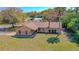 Charming single-story home boasts a well-manicured lawn and inviting curb appeal at 1842 Evergreen Dr, Edgewater, FL 32141