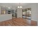 Bright dining area that seamlessly transitions to the kitchen and outdoor seating, perfect for entertaining at 1842 Evergreen Dr, Edgewater, FL 32141