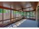 Relaxing sun room with multiple windows offering great views and natural light at 1842 Evergreen Dr, Edgewater, FL 32141