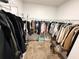 Walk-in closet with ample hanging space and organized clothing at 238 Miniehaha Cir, Haines City, FL 33844