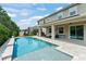 Backyard pool with a patio and outdoor play equipment at 2401 Oxmoor Dr, Deland, FL 32724
