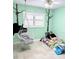 Unique bedroom with panda wall art, hammock chair and bright colored bedding at 2630 S Tanner Rd, Orlando, FL 32820