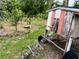 This property features a mobile chicken coop in the backyard at 2630 S Tanner Rd, Orlando, FL 32820