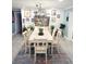 Traditional dining room with light fixture, wainscoting, and neutral-colored walls at 2630 S Tanner Rd, Orlando, FL 32820