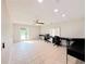 Versatile flex space with large windows and room for multiple desks at 2630 S Tanner Rd, Orlando, FL 32820