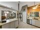 Open view from kitchen to the living room showcasing seamless flow and design at 2916 Maldive Ct, Deltona, FL 32738