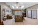 Cozy living room with skylights, fireplace, and neutral tones at 2916 Maldive Ct, Deltona, FL 32738